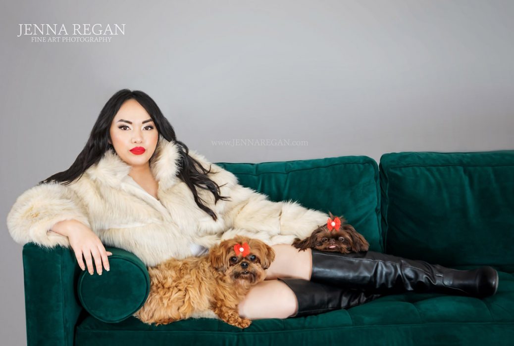woman on couch with two small dogs- pet photography session in studio